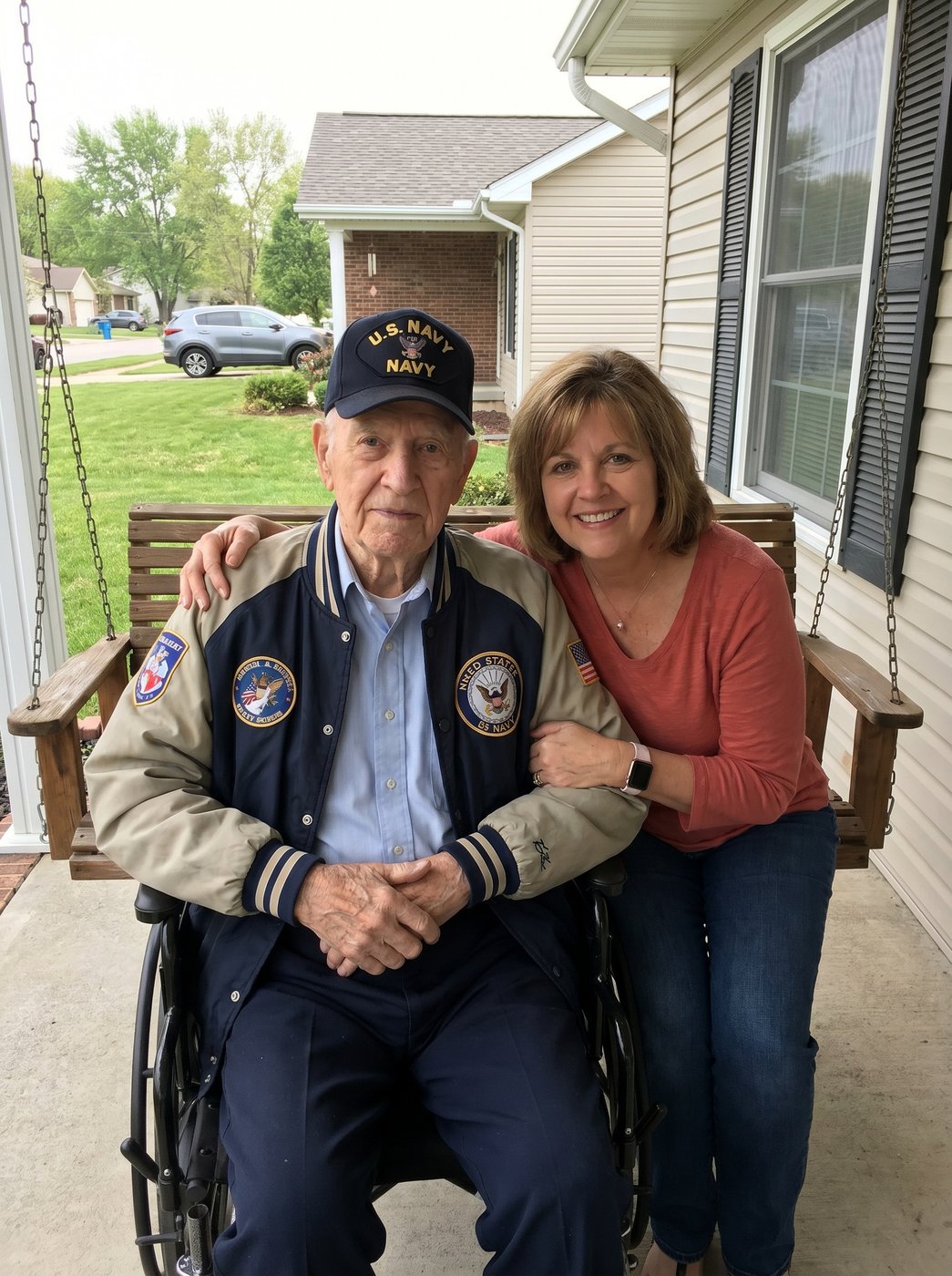 A Navy veteran and his daughter on the front porch